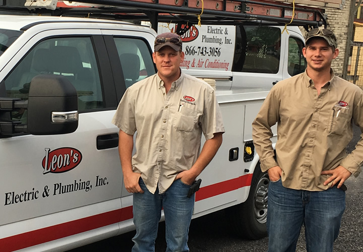 Leon's crew in front of truck